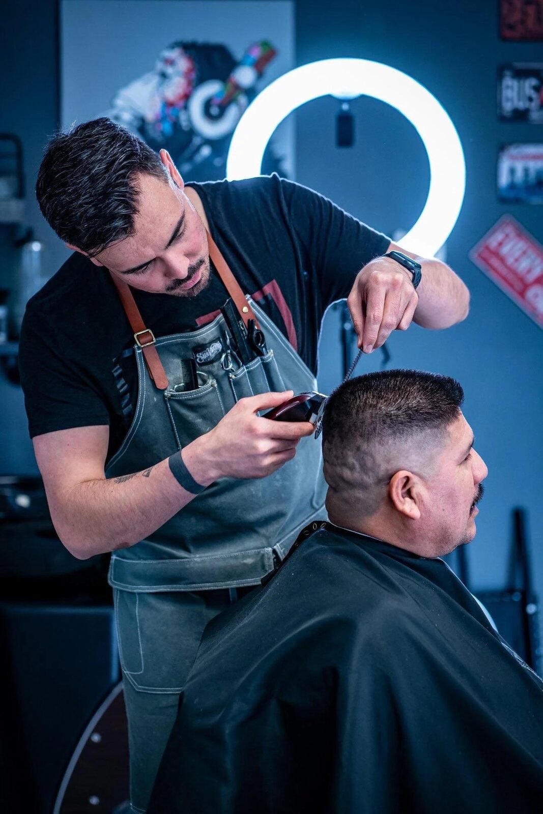Barber performing a precision skin fade at Lukas Barbershop in Sliema