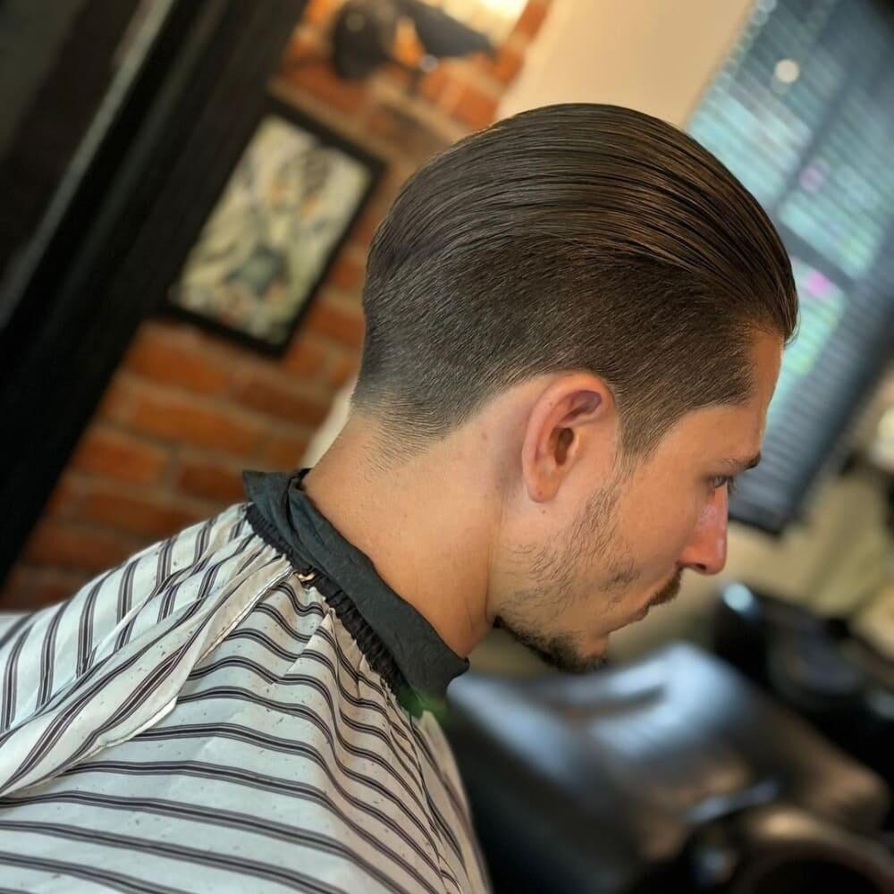 Classic slicked back cut with tapered fade